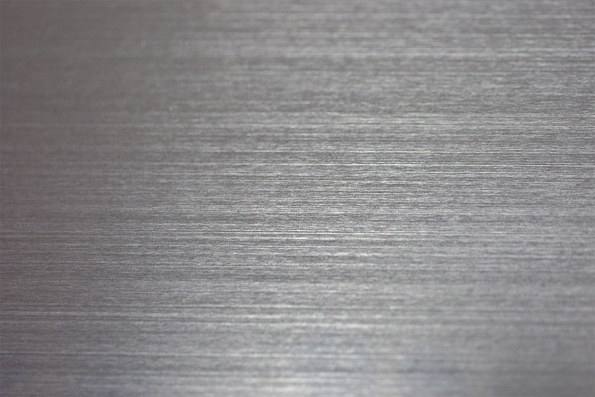 closeup of line graining in aluminum surface